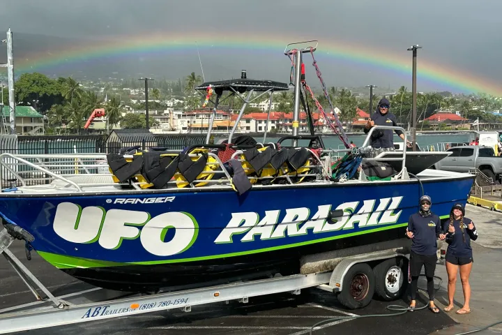 a boat parked on the side of a road