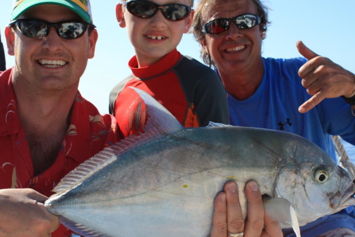 a person holding a fish