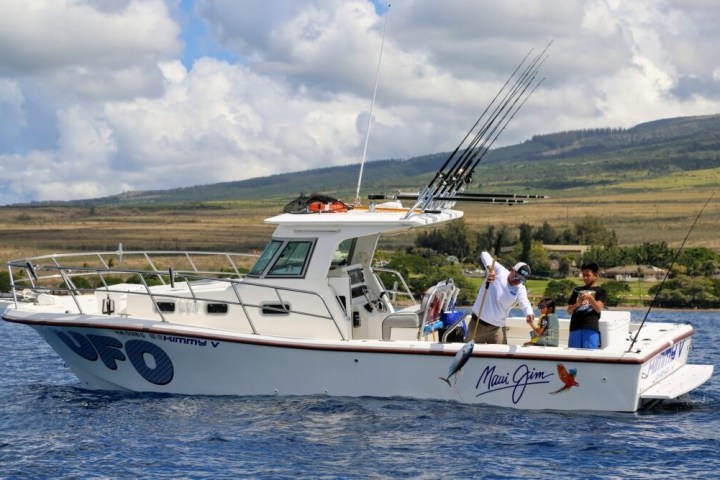 a small boat in a large body of water