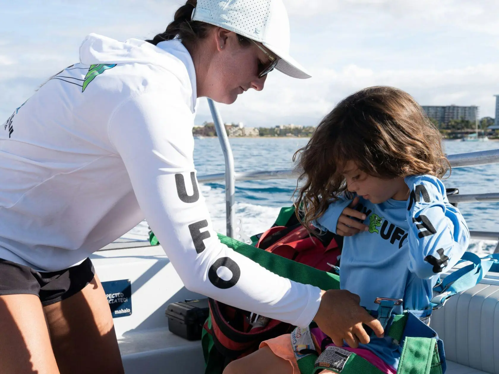 a couple of people that are sitting on a bench