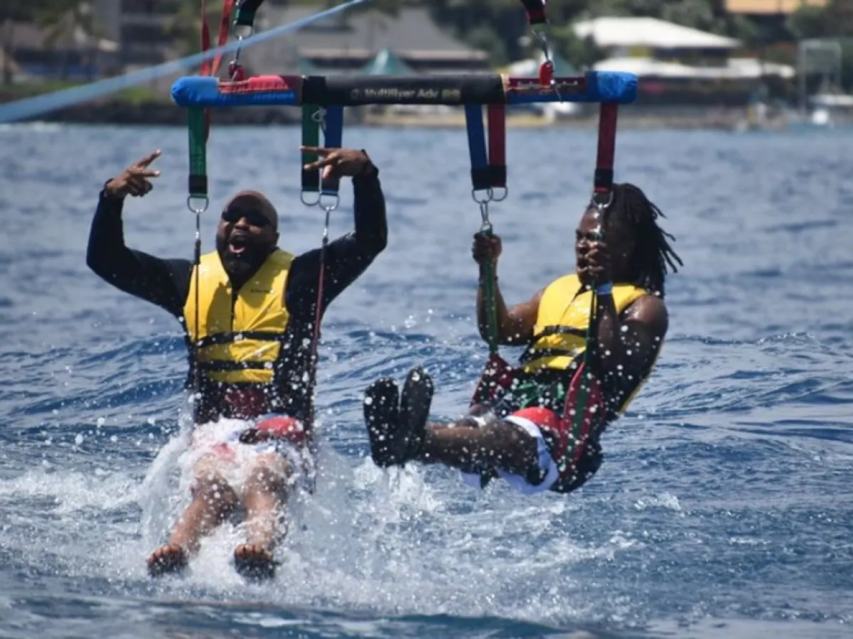 a man riding a surfboard in the water