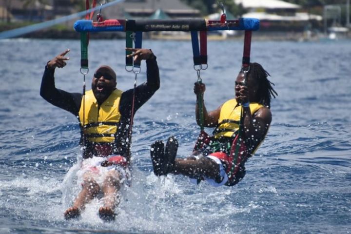 a man riding a surfboard in the water